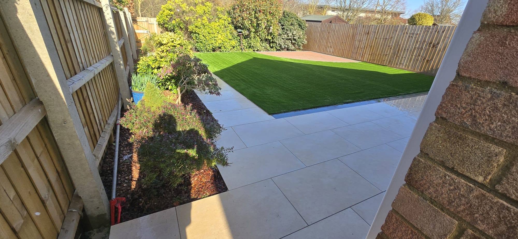 Garden with sharp lawn edge and patio